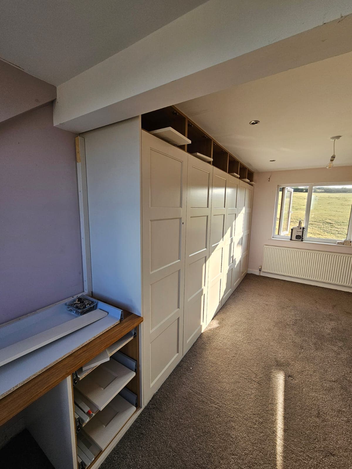 Bespoke Fitted Furniture — Window Side — PHE Decorating Sheffield project photo