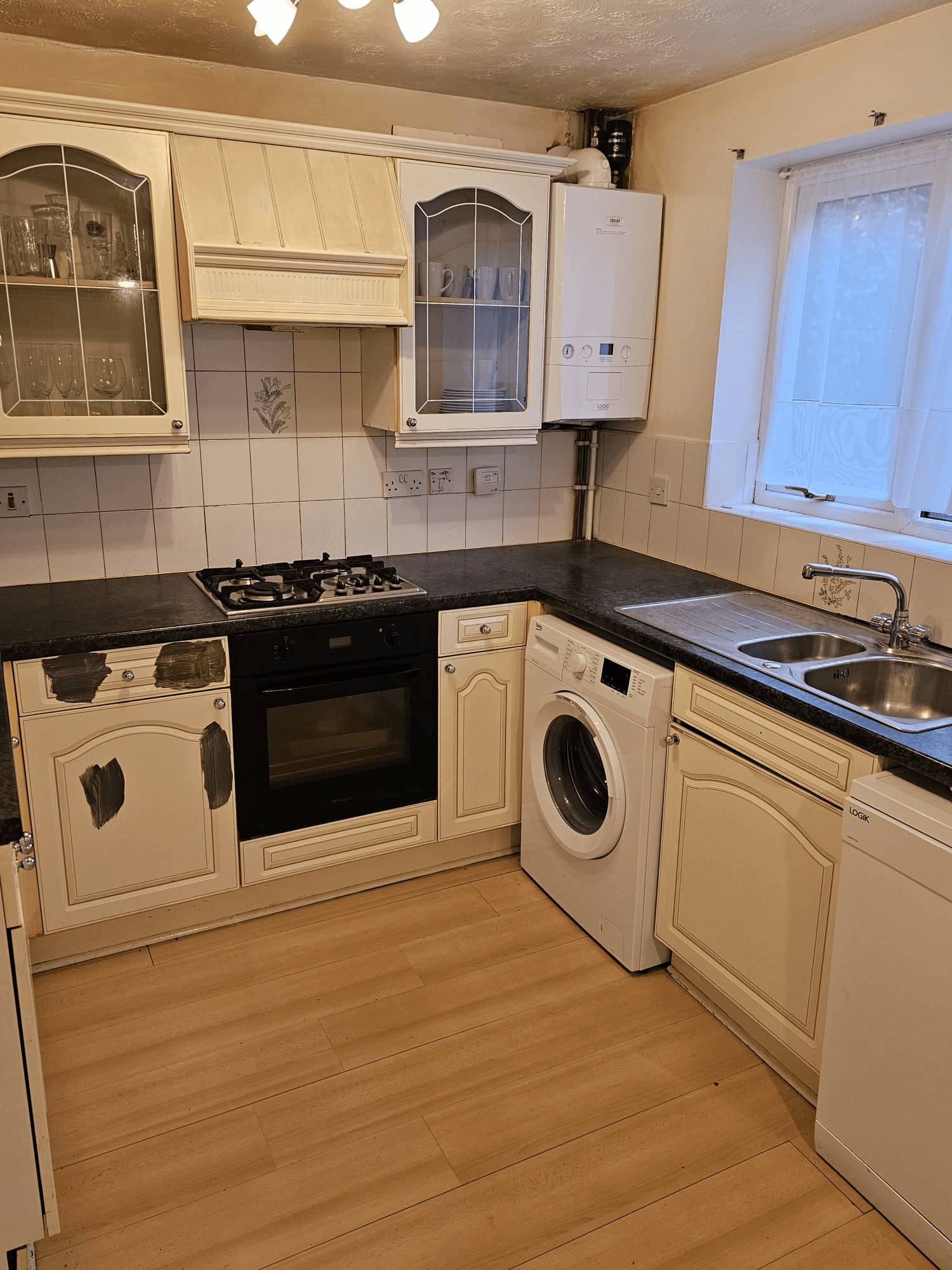 Kitchen respray Sheffield — cream kitchen finished with appliances in place