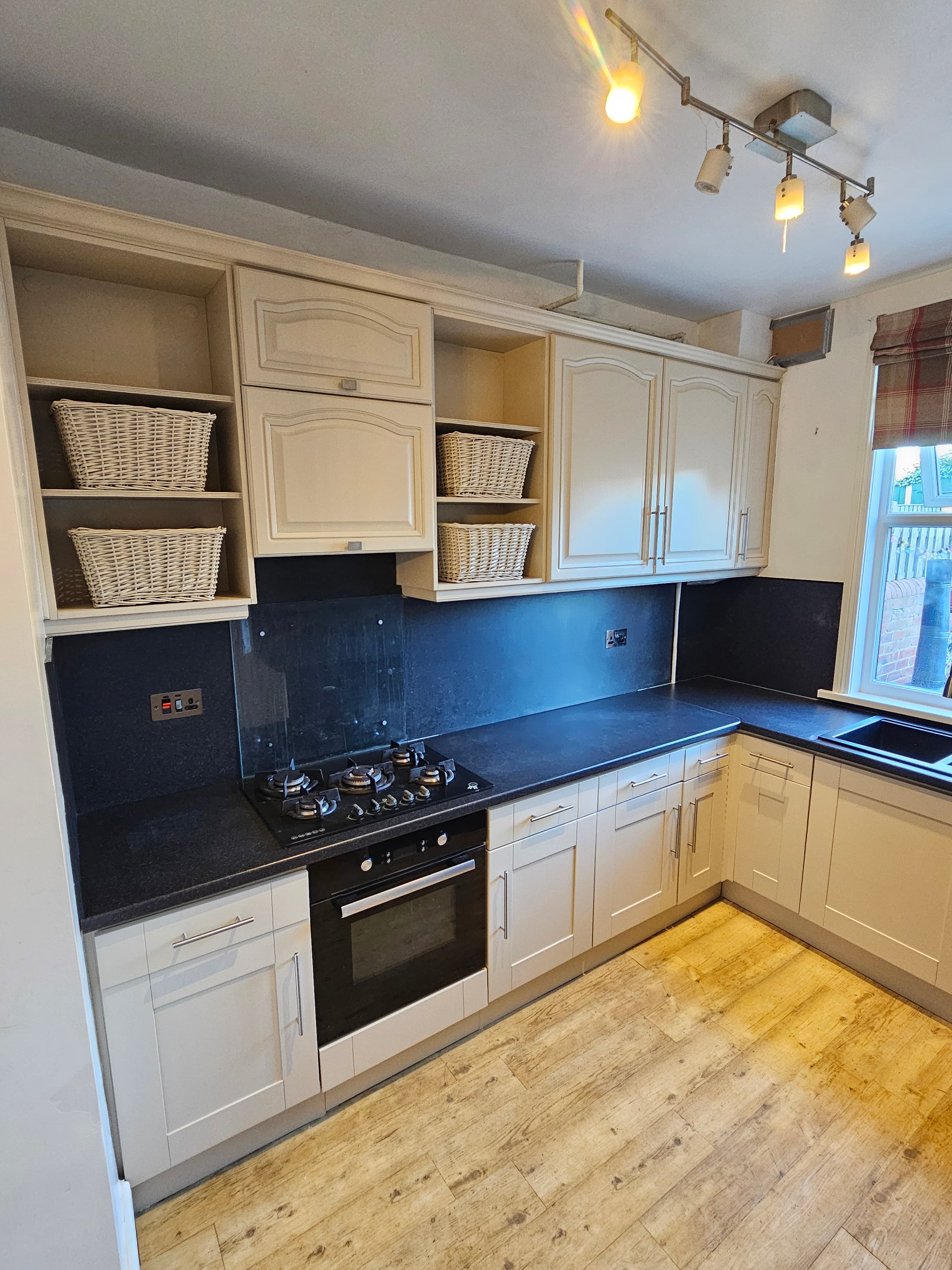 Kitchen respray Sheffield — completed cream kitchen, same units as before photo