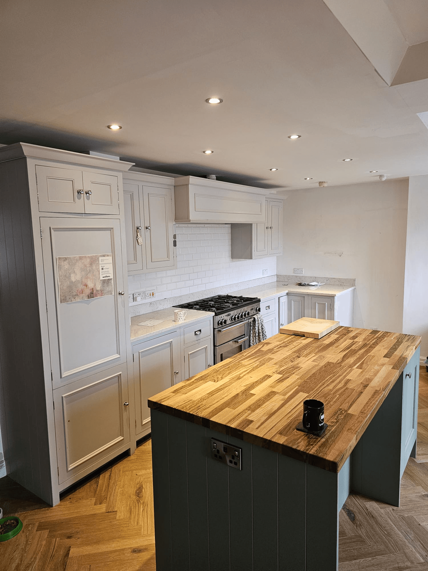 Kitchen respray Sheffield — white kitchen with island and herringbone parquet floor