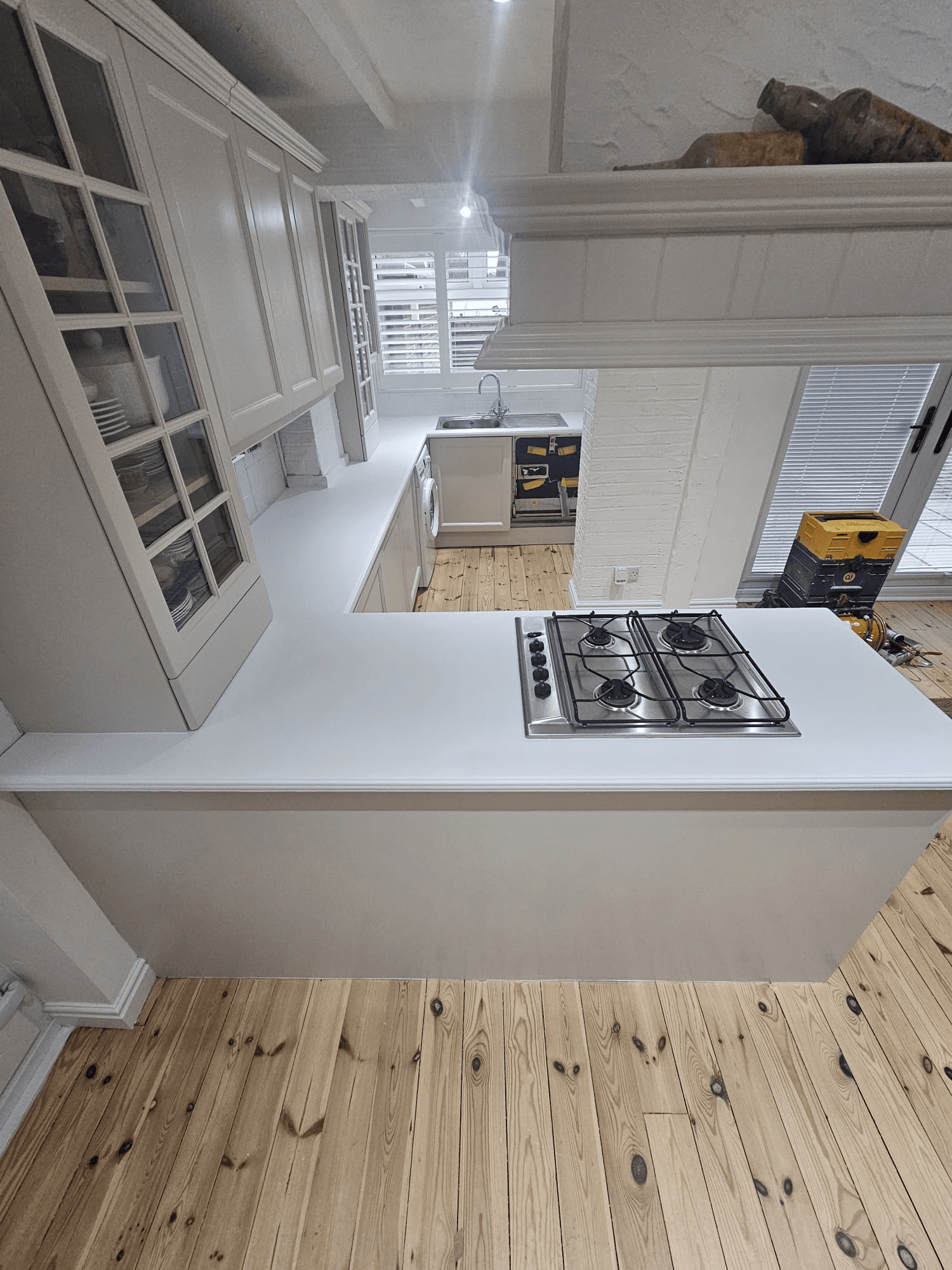 Kitchen respray Sheffield — white kitchen with island worktop