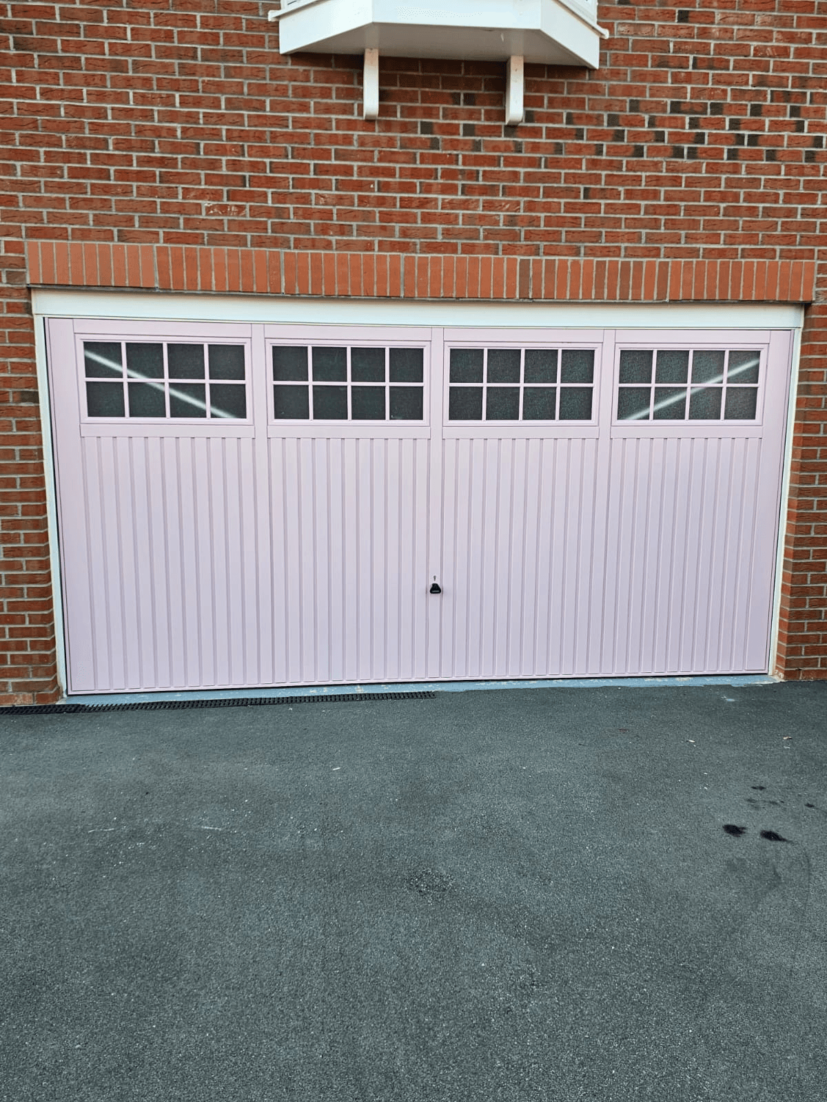 Garage door spraying Sheffield — white colour respray finished result