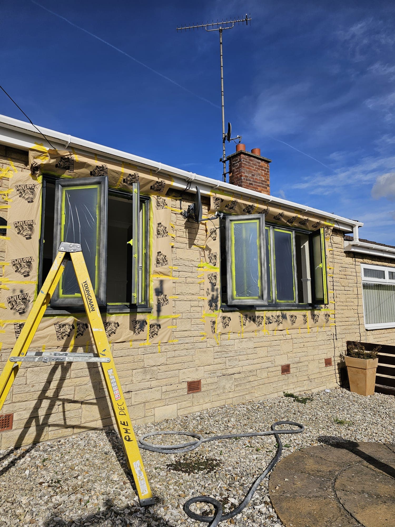 Client-supplied view 20 of recent UPVC window spraying work by PHE Decorating