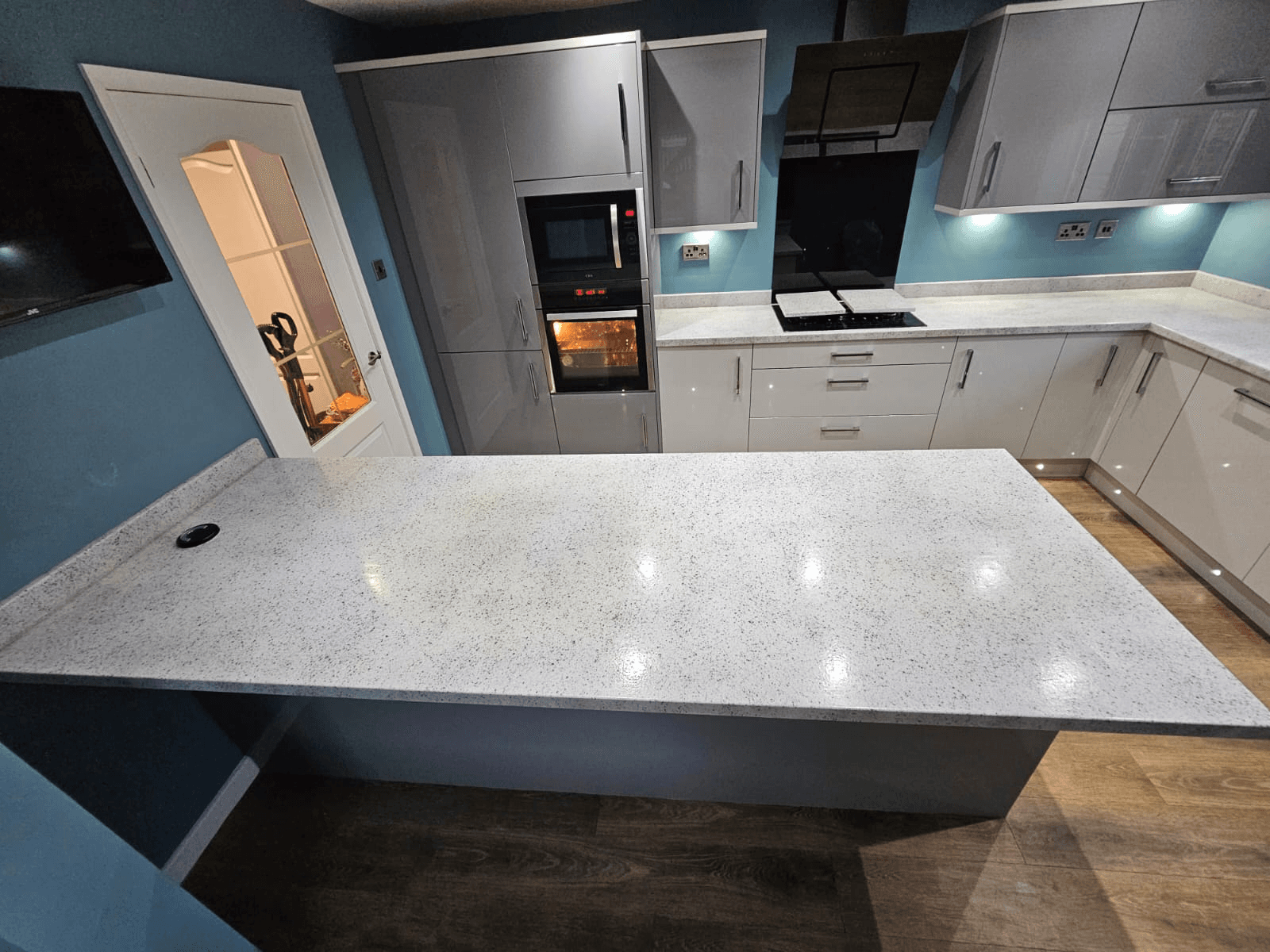 Kitchen worktop spraying Sheffield — white granite island and kitchen worktops